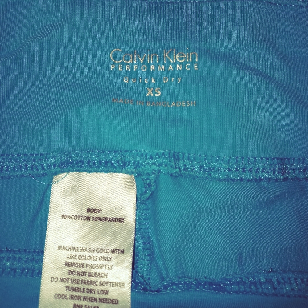 3/4 length Calvin Klein Capri bikers aqua color size xs